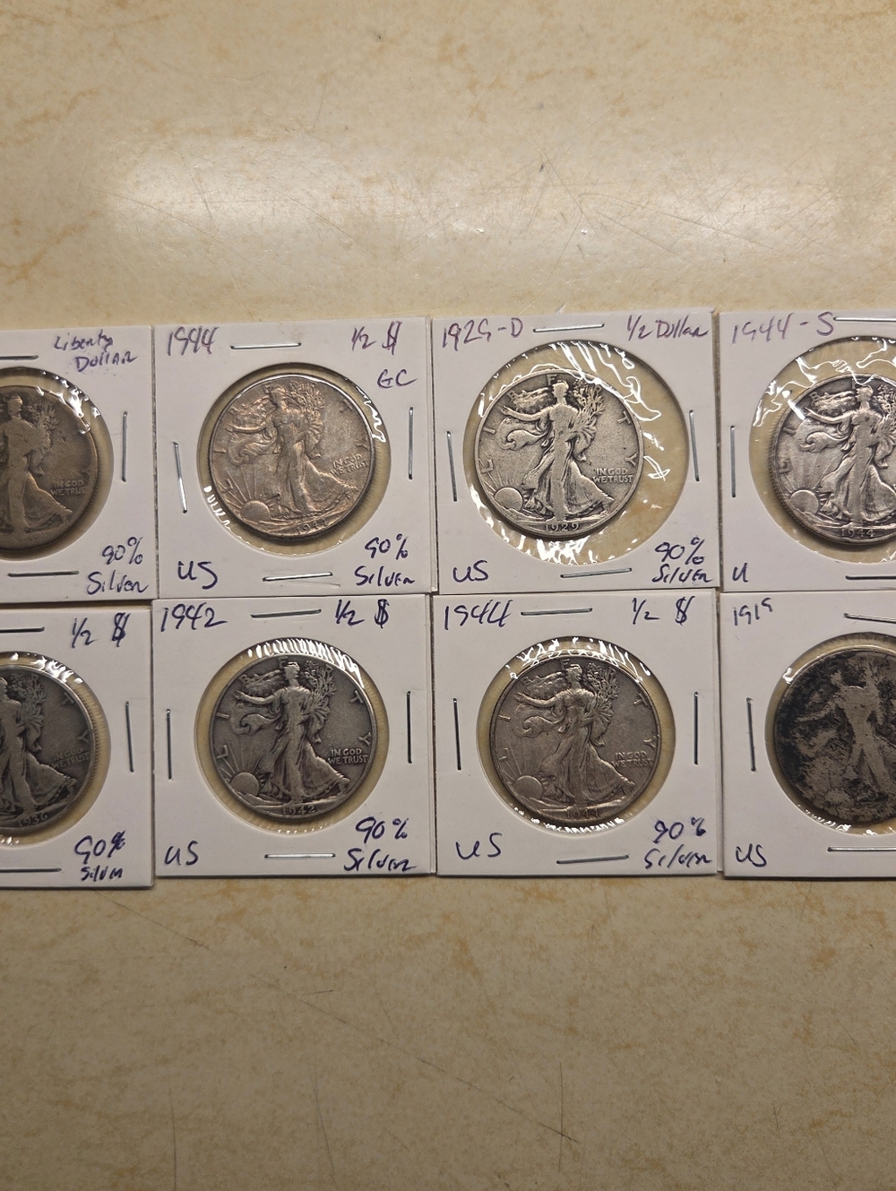 Lot of 8 circulated Walking Liberty Half Dollars - Various Years And Condition